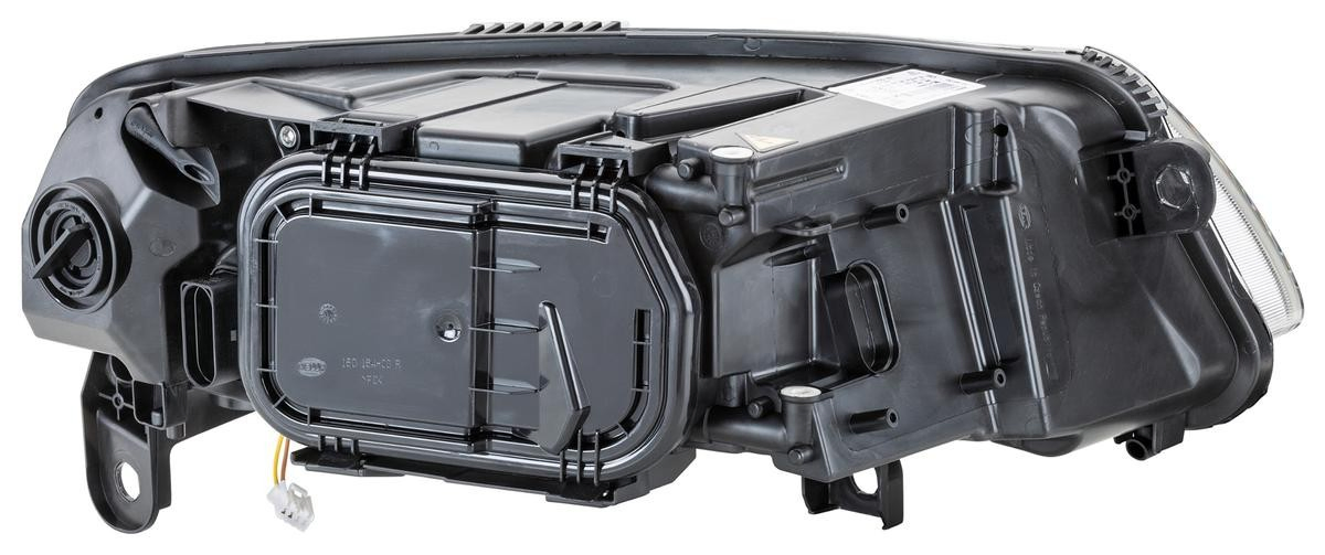 Reflektor lewy HELLA 1EL009925511 cena, od 398,91 USD