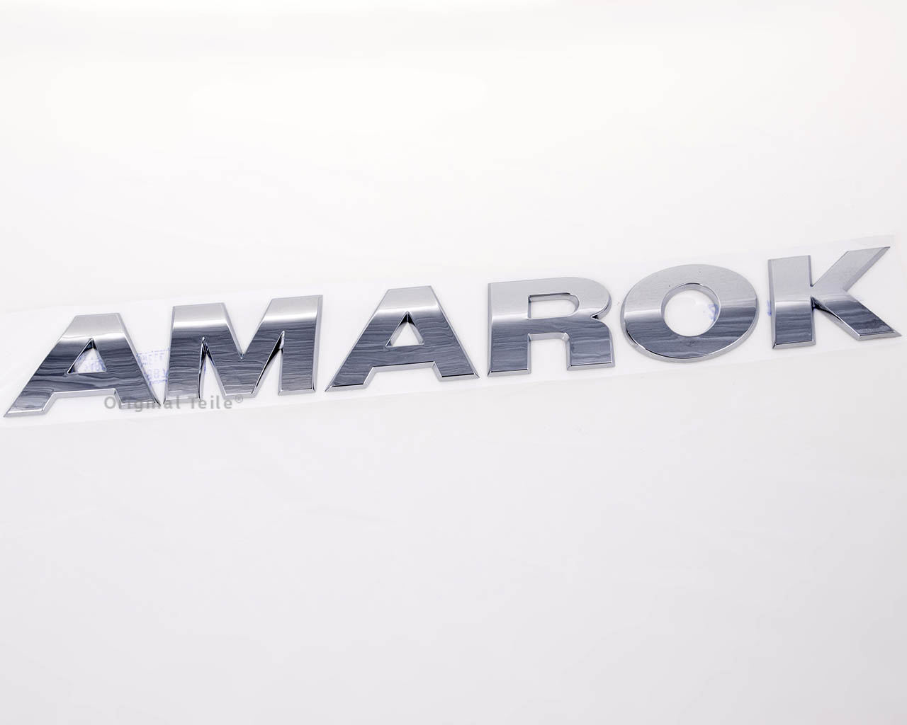 Emblemat na klapę bagaznika (znaczek firmowy) do Volkswagen AMAROK 2HA, 2HB, S1B, S6B, S7A, S7B