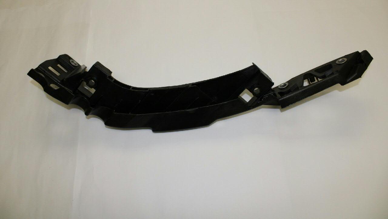 6R0805072E VAG Wspornik (adapter) mocowania reflektora przedniego prawego