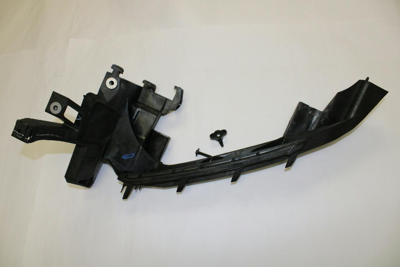 Wsponik (adapter) mocowania reflektora przedniego lewego VAG 80A805607