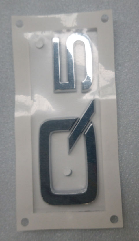 8R08537412ZZ VAG Emblemat na klapę bagaznika (znaczek firmowy)