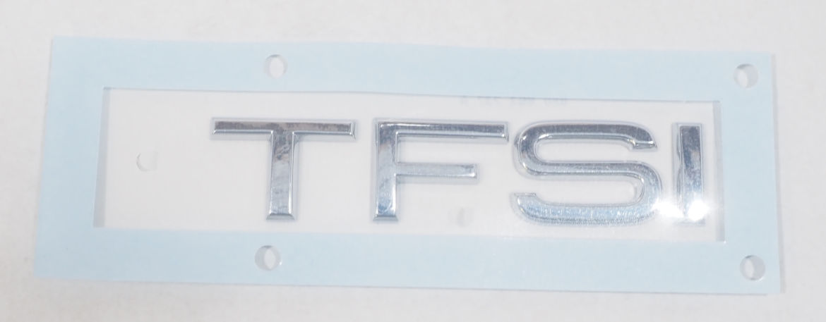 Emblemat na klapę bagaznika (znaczek firmowy) do Audi Q3  8UB, 8UG